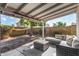 Relaxing covered patio with seating and backyard access at 18825 N 34Th St, Phoenix, AZ 85050