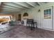 Covered patio with tile flooring, grill, and seating area at 18825 N 34Th St, Phoenix, AZ 85050