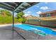 Relaxing pool area with patio cover and inflatable at 18825 N 34Th St, Phoenix, AZ 85050