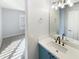 Bathroom with a vanity, sink and mirror at 2014 N 94Th Gln, Phoenix, AZ 85037