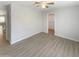 Bedroom with ceiling fan and closet at 2014 N 94Th Gln, Phoenix, AZ 85037