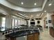 Island kitchen with granite countertops and stainless steel appliances at 20334 E Colt Dr, Queen Creek, AZ 85142