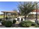 Relaxing community gazebo with picnic tables and landscaping at 20409 E Escalante Ct, Queen Creek, AZ 85142