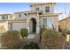 Two-story home with attractive landscaping and a welcoming entryway at 20409 E Escalante Ct, Queen Creek, AZ 85142