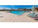 Inviting community pool with lounge chairs and shade structures for relaxing days at 21804 N 38Th Pl, Phoenix, AZ 85050