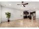 Open concept layout showcasing the kitchen and an adjacent living space at 21804 N 38Th Pl, Phoenix, AZ 85050