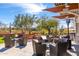 A tranquil outdoor seating area provides residents a place to relax and socialize around the fire pit at 21804 N 38Th Pl, Phoenix, AZ 85050