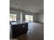 Modern kitchen island with white countertop and dark brown base cabinets at 22216 W Skinner Rd, Wittmann, AZ 85361