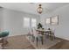 Bright dining room with modern chandelier and stylish decor at 22897 E Carriage Way, Queen Creek, AZ 85142