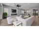 Living room with fireplace, built-in shelving, and stylish decor at 22897 E Carriage Way, Queen Creek, AZ 85142