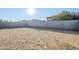 Empty lot with block wall and surrounding homes visible at 25565 W Gwen St, Buckeye, AZ 85326