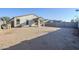 Spacious backyard with block wall, providing privacy and space at 25565 W Gwen St, Buckeye, AZ 85326