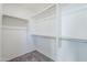 Large walk-in closet with double hanging rods and shelving at 25565 W Gwen St, Buckeye, AZ 85326