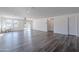 Bright and airy living room with wood-look floors and lots of natural light at 25565 W Gwen St, Buckeye, AZ 85326