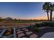 Landscaped backyard with stone pathway at 27831 N Makena Pl, Peoria, AZ 85383