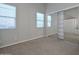 Spacious bedroom with mirrored closet doors and natural light at 27831 N Makena Pl, Peoria, AZ 85383