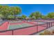 Multiple pickleball courts with chain link fencing at 27831 N Makena Pl, Peoria, AZ 85383