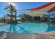 Inviting resort-style pool with shade structures and lounge chairs at 27831 N Makena Pl, Peoria, AZ 85383