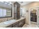 Double vanity bathroom with granite countertop and large closet at 2803 E Cobalt St, Chandler, AZ 85225