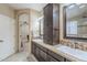 Double vanity bathroom with dark brown cabinets and mosaic tile at 2803 E Cobalt St, Chandler, AZ 85225