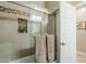 Clean bathroom with shower/tub combo and neutral tile at 2803 E Cobalt St, Chandler, AZ 85225