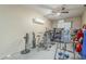 Garage with home gym, exercise equipment, and storage at 2803 E Cobalt St, Chandler, AZ 85225