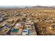 Aerial view of house, pool, detached garage, and surrounding desert landscape at 2809 W Paso Nuevo Dr, Phoenix, AZ 85086