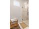 Modern bathroom with a walk-in shower and tiled floor at 2809 W Paso Nuevo Dr, Phoenix, AZ 85086