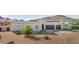 White stucco house with two-car garage and desert landscaping at 2809 W Paso Nuevo Dr, Phoenix, AZ 85086