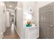 Bright hallway with decorative accents and wood flooring at 2809 W Paso Nuevo Dr, Phoenix, AZ 85086