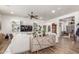 Spacious living room with built-in shelving and hardwood floors at 2809 W Paso Nuevo Dr, Phoenix, AZ 85086