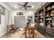 Home office with built-in bookcases and hardwood floors at 2809 W Paso Nuevo Dr, Phoenix, AZ 85086