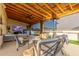 Covered patio with comfortable seating and a mounted TV at 2809 W Paso Nuevo Dr, Phoenix, AZ 85086