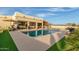 Inviting pool and patio with artificial turf and a covered patio at 2809 W Paso Nuevo Dr, Phoenix, AZ 85086