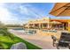 Stunning pool and patio with lounge chairs, umbrella, and a pergola at 2809 W Paso Nuevo Dr, Phoenix, AZ 85086