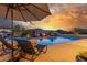 Relaxing pool area with lounge chairs and sunset views at 2809 W Paso Nuevo Dr, Phoenix, AZ 85086