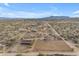 Aerial view of property with home, stables, and riding arena at 32905 N 140Th St, Scottsdale, AZ 85262