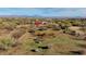 Aerial view of a ranch with livestock and desert landscape at 32905 N 140Th St, Scottsdale, AZ 85262