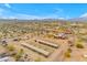 Aerial view of property showing house and horse stables at 32905 N 140Th St, Scottsdale, AZ 85262