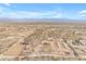 Aerial view of property with large house and horse stables at 32905 N 140Th St, Scottsdale, AZ 85262