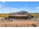 Luxury property with a circular driveway and expansive desert landscape at 32905 N 140Th St, Scottsdale, AZ 85262