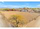 Horse arena with barn and RV in background, surrounded by desert landscape at 32905 N 140Th St, Scottsdale, AZ 85262