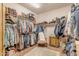 Large walk-in closet with ample shelving and hanging space at 32905 N 140Th St, Scottsdale, AZ 85262