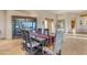 Formal dining room with dark wood table and display cabinet at 32905 N 140Th St, Scottsdale, AZ 85262