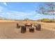 Relaxing fire pit area with rustic seating at 32905 N 140Th St, Scottsdale, AZ 85262