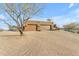 Two-car garage with desert landscaping at 32905 N 140Th St, Scottsdale, AZ 85262