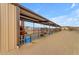 Covered horse stable with a brown horse at 32905 N 140Th St, Scottsdale, AZ 85262