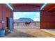 View from inside the stable showing horses and mountain views at 32905 N 140Th St, Scottsdale, AZ 85262