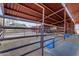 Covered stalls and metal roofing in this horse stable at 32905 N 140Th St, Scottsdale, AZ 85262