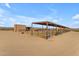 Spacious horse stables with covered stalls and individual paddocks at 32905 N 140Th St, Scottsdale, AZ 85262